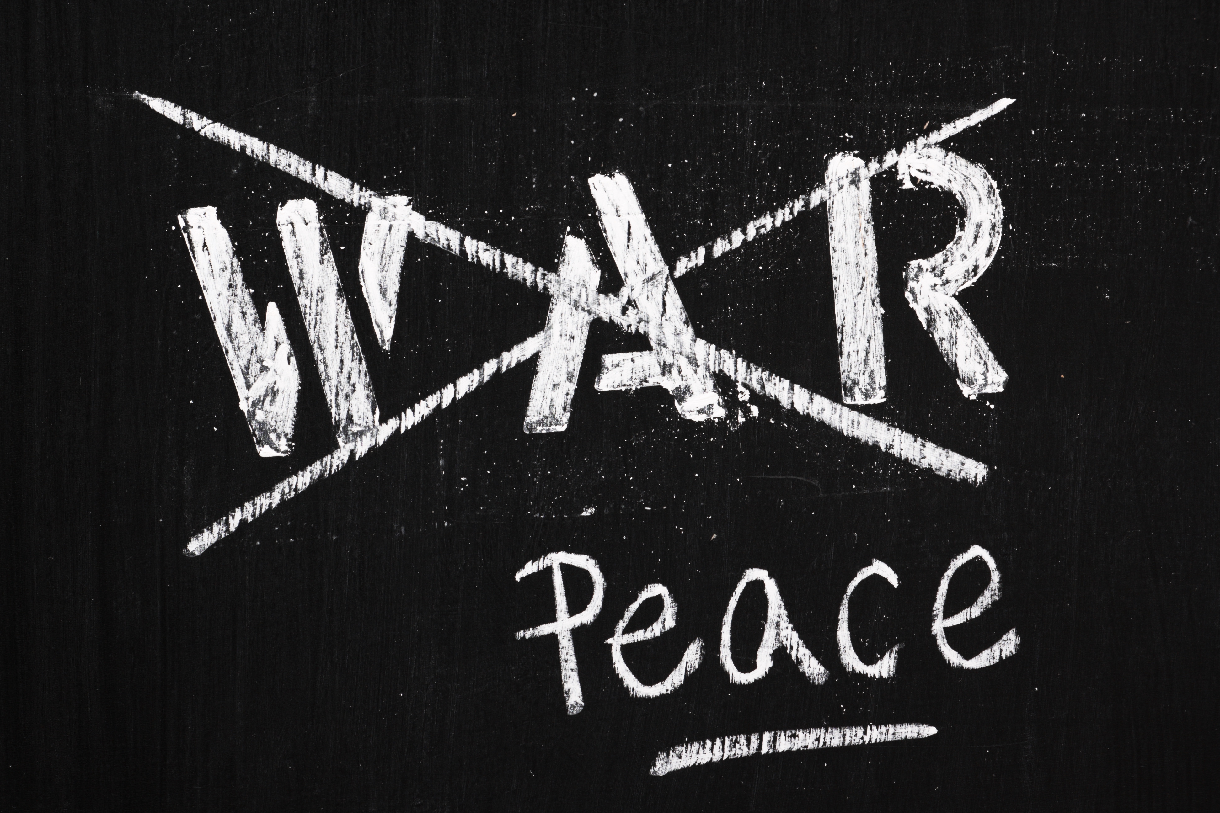 The word War is replaced by Peace on a blackboard