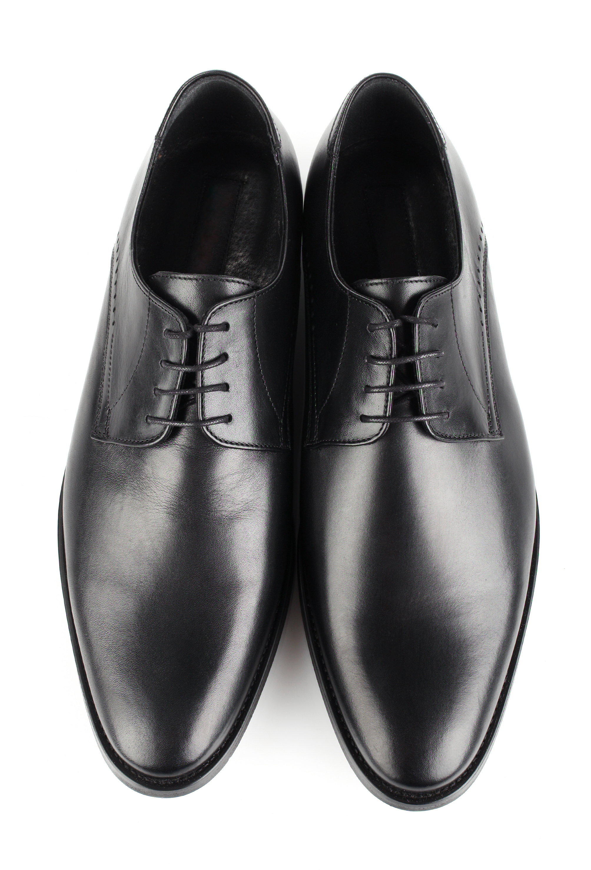 Classic black leather mens shoes with laces isolated on white background top view